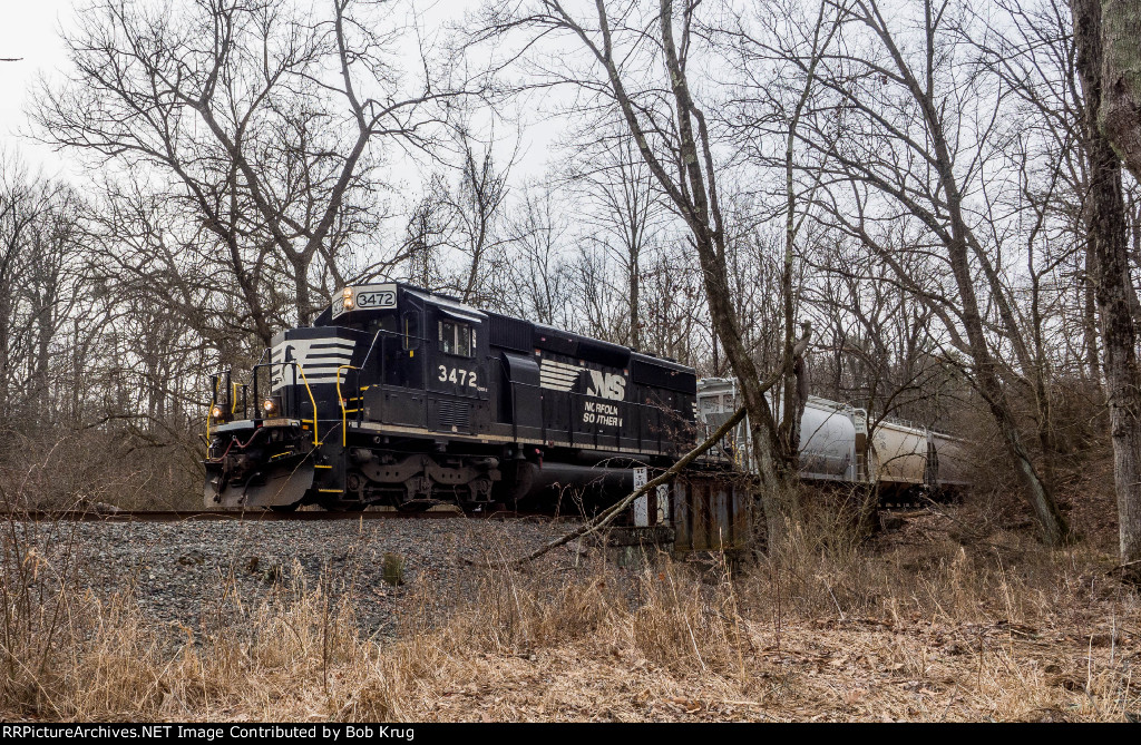 NS 3472 leads local freight train symbol H75 eastbound through Housenick Memorial Park in Bethlehem Township